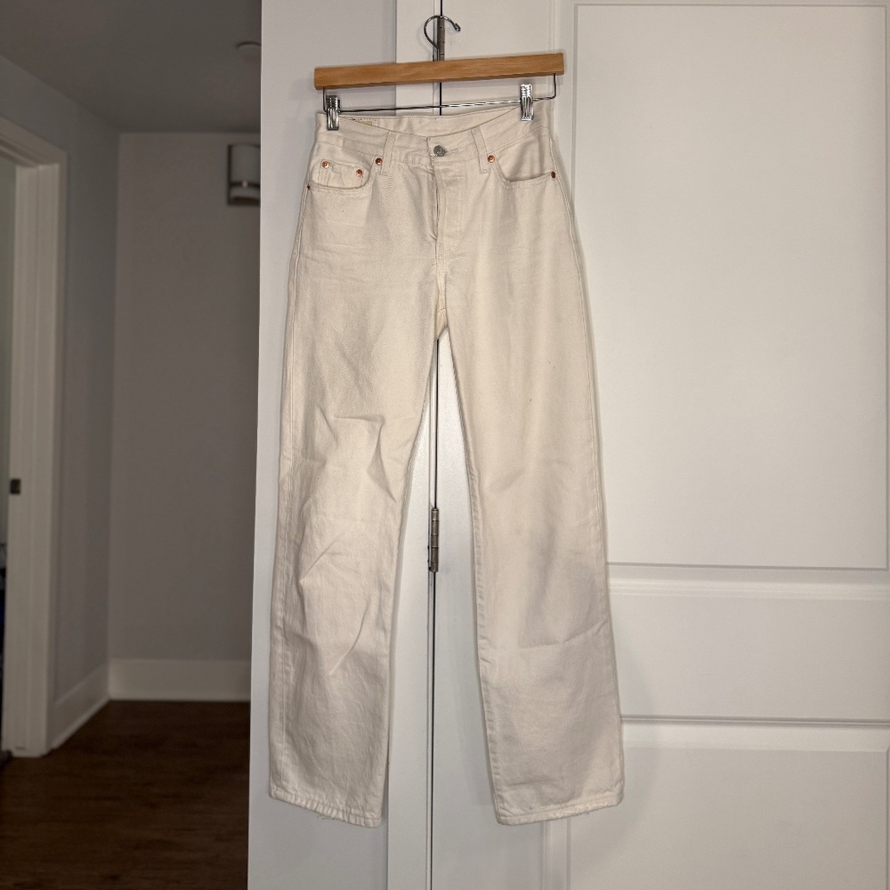 Levi’s 501 Original Straight or Ribcage Straight.